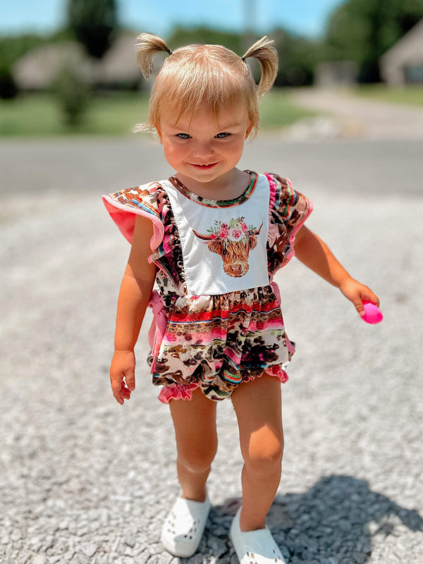 Pink serape cow romper